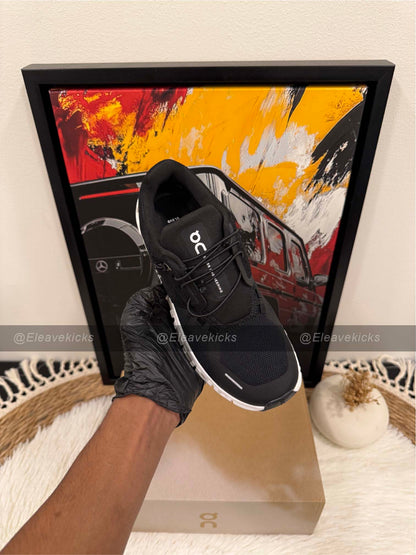 On Cloud X 4 AD sneaker in black and asphalt color.